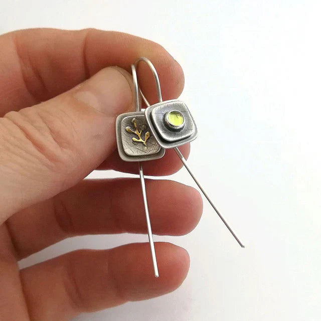 Auskari ar Dzelteno Kristālu