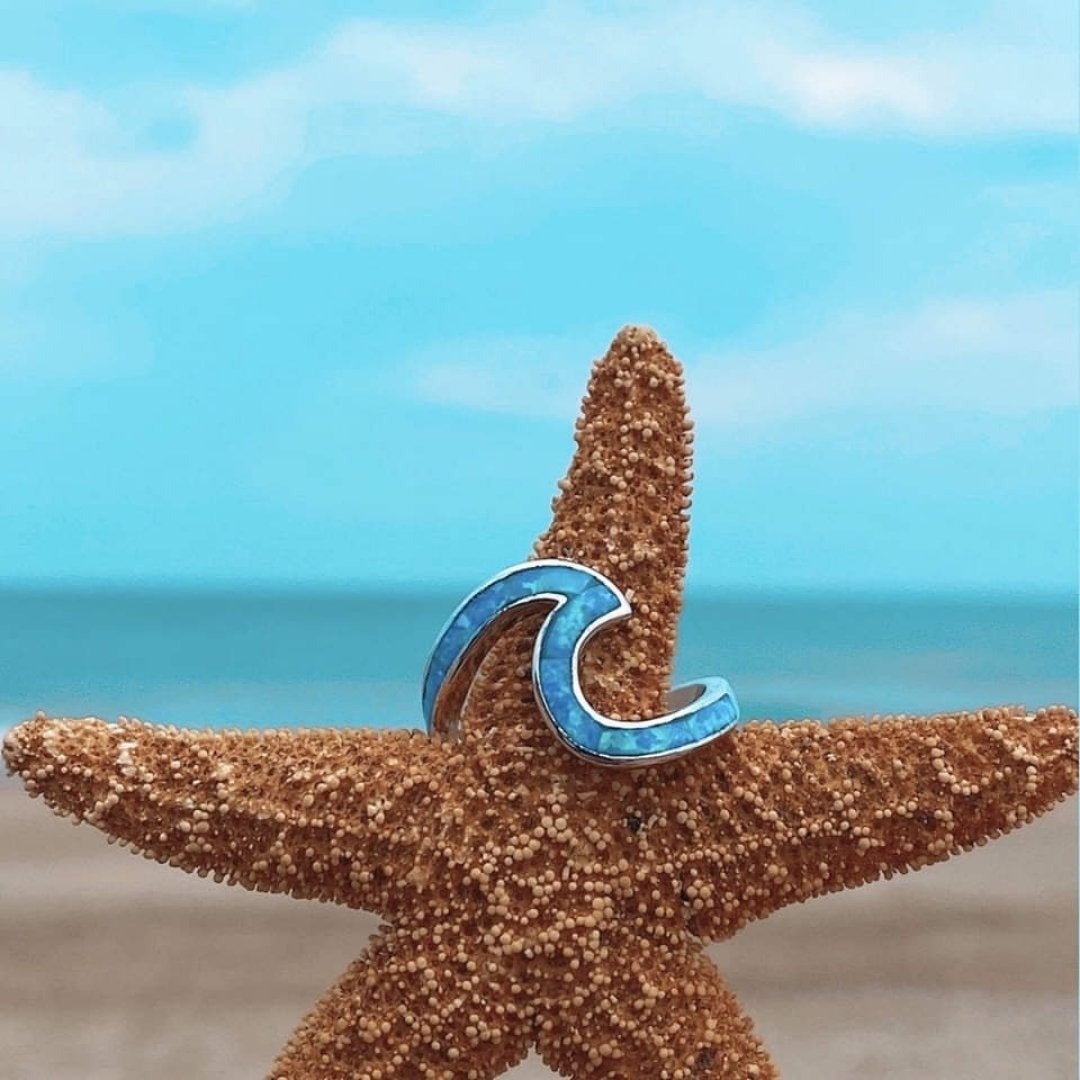 Anel jūras viļņi opālā un sudrabā