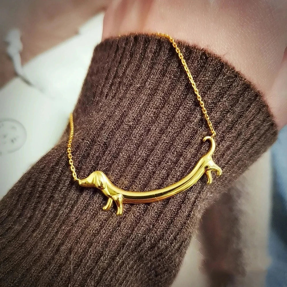 Suņu kakla siksna zeltainā tonī