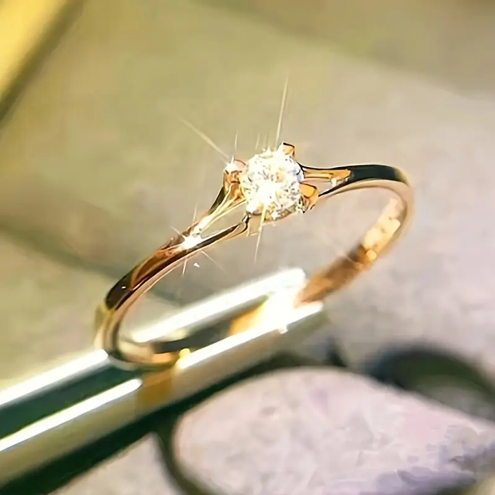 Anel Anello stikla baltā krāsā ar zelta detaļām